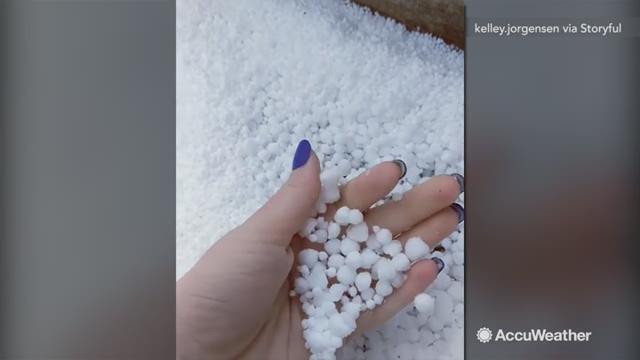 Blizzard conditions mixed with severe thunderstorms have caused the town of Brookings, South Dakota to experience snow mixed with hail.  Some of the hail were shown to be pea-sized.