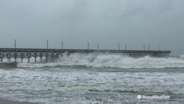 As Hurricane Florence barrels toward the Carolinas, watch as these large waves batter this pier in Topsail Beach, North Carolina.
