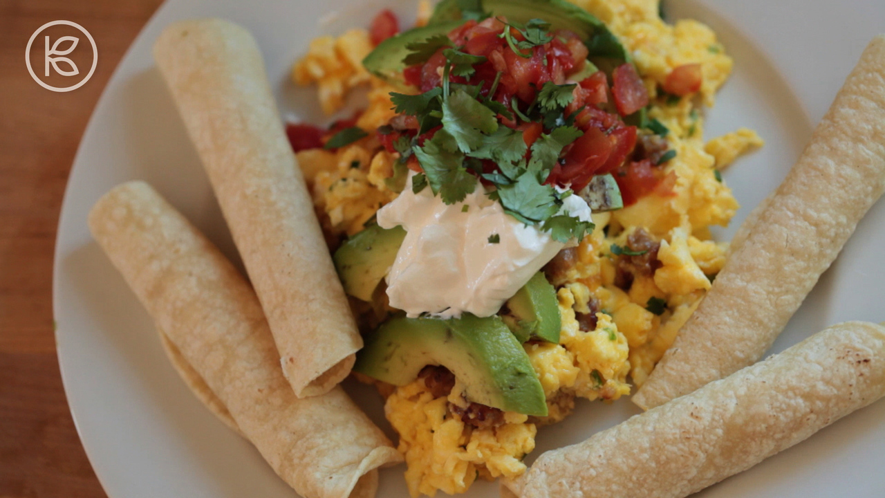 There's nothing fancy about this recipe...it's just a great idea and a quick, easy, colorful meal to throw together for breakfast or dinner! Scrambled eggs and warm tortillas go so well with all these fresh Mexican flavors...you could also drizzle some en